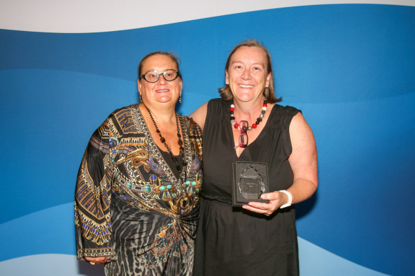 A photo of Cate McGrath being presented the 'Official of the Meet' award by Jo Teagle (Chief Referee)