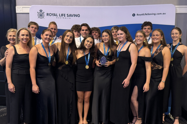 A photo of Western Australia Pool Life Saving Team, receiving the Interstate Championship Trophy